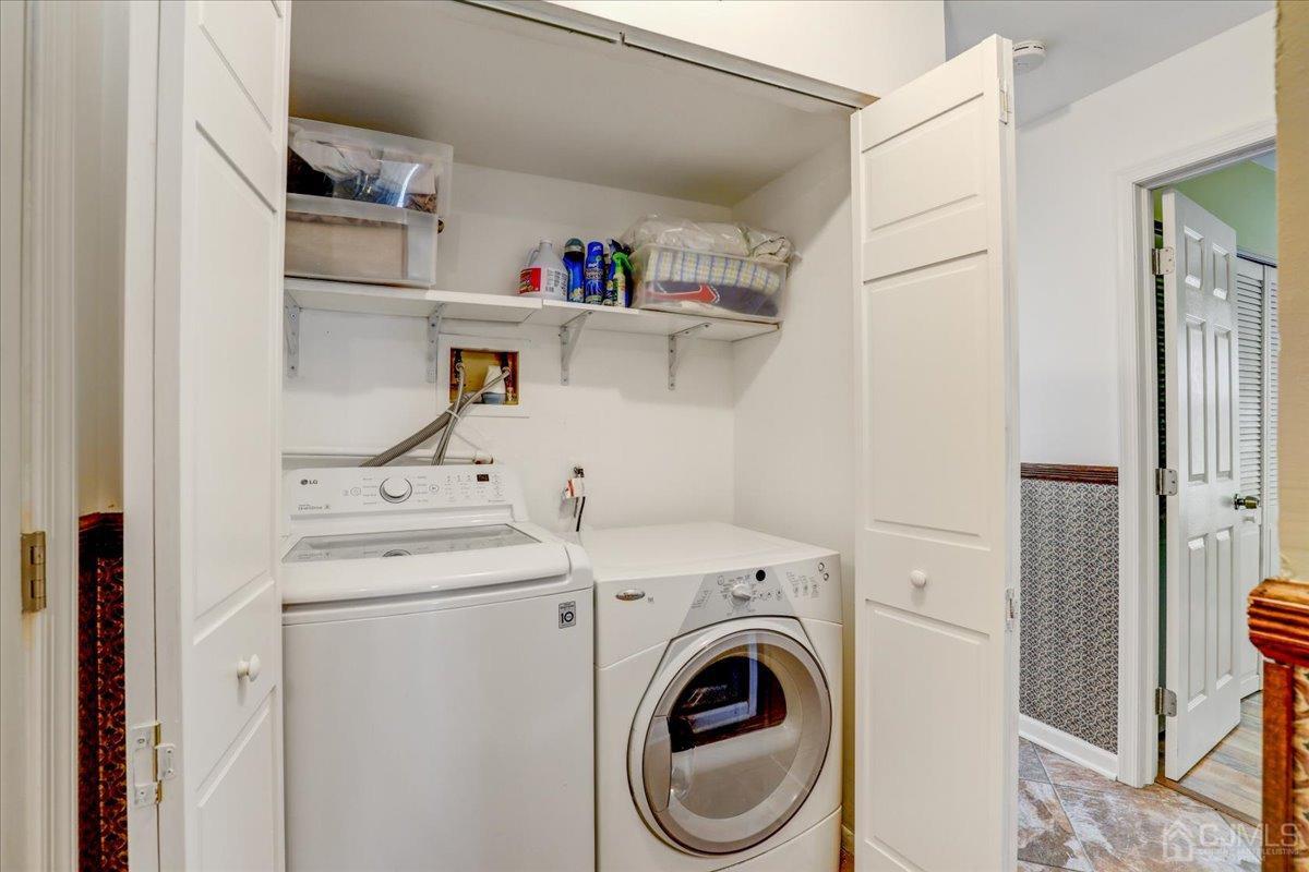 95 Neilly Court Old Bridge, NJ 08857 - Photo 22 of 35 a utility room with dryer and washer