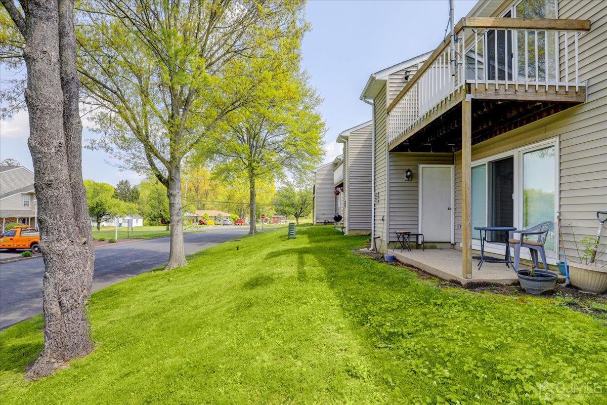 95 Neilly Court Old Bridge, NJ 08857 - Photo 26 of 35 a view of a house with backyard and sitting area