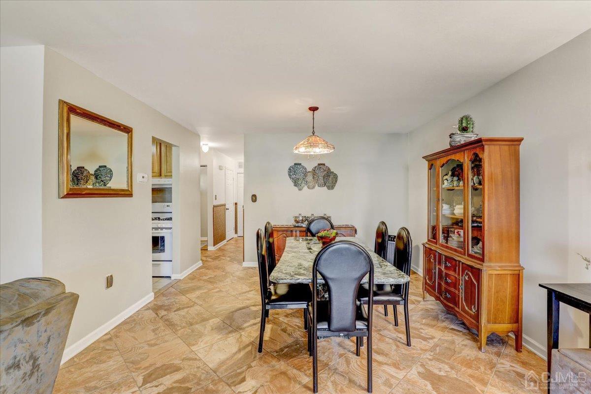 95 Neilly Court Old Bridge, NJ 08857 - Photo 5 of 35 a view of a dining room with furniture