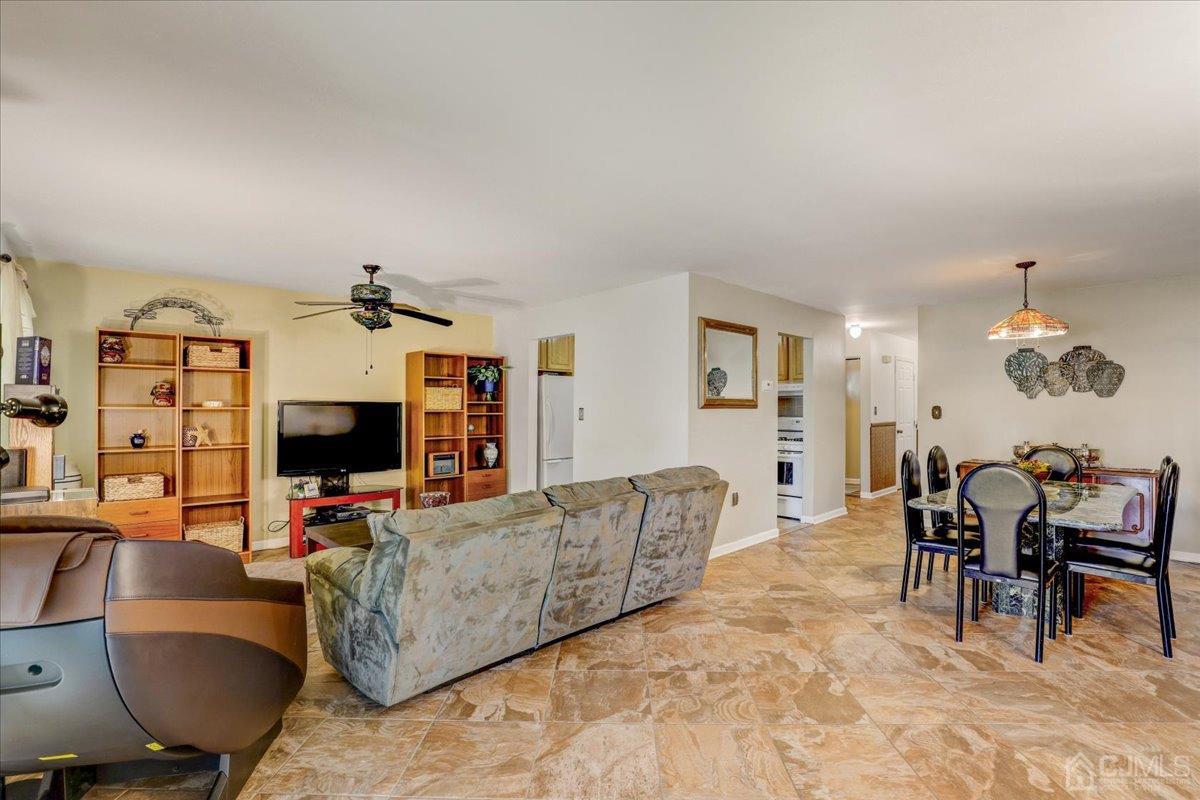 95 Neilly Court Old Bridge, NJ 08857 - Photo 9 of 35 a living room with furniture and a flat screen tv