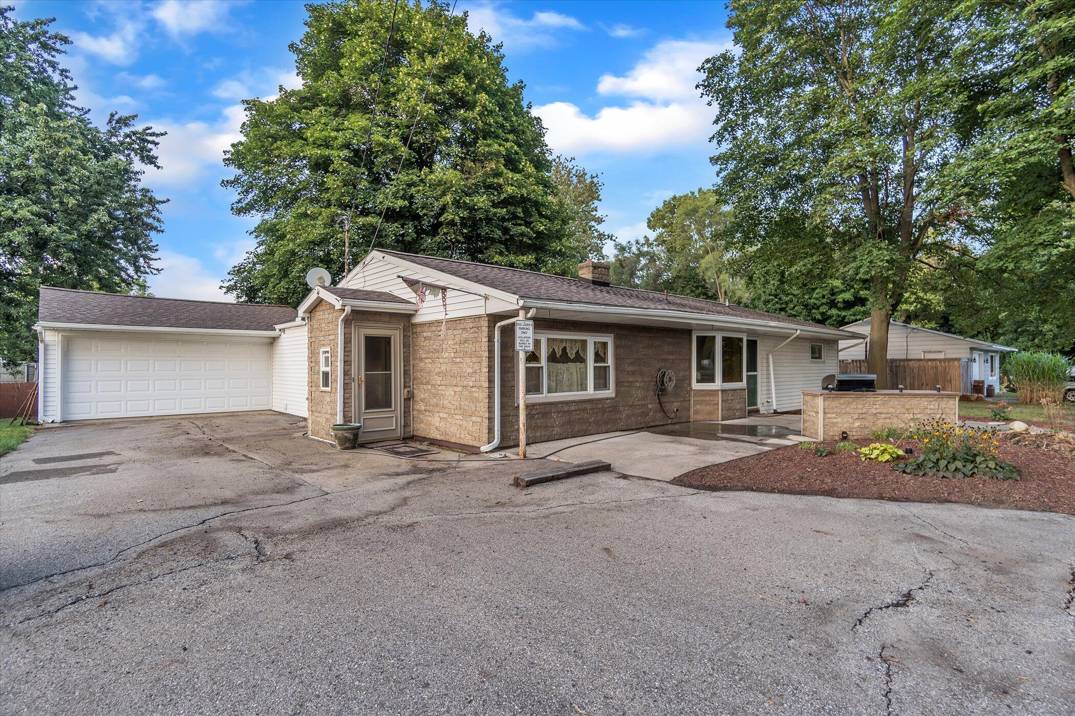 3404 Brooklyn Road Jackson, MI 49203 - Photo 2 of 34 02-3404 Brooklyn Rd-Windowstill-Real-Est