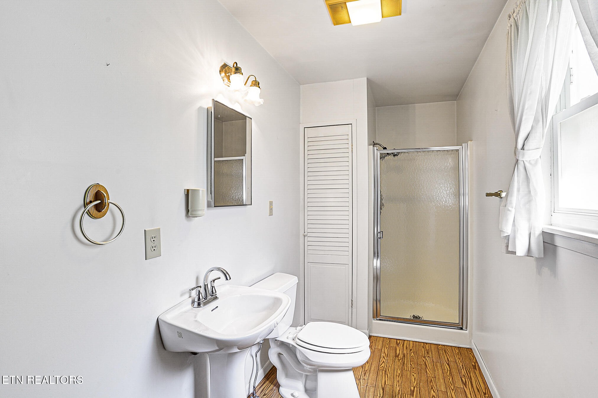 2015 Carolyn Drive Jefferson City, TN 37760 - Photo 11 of 44 a bathroom with a sink and a mirror