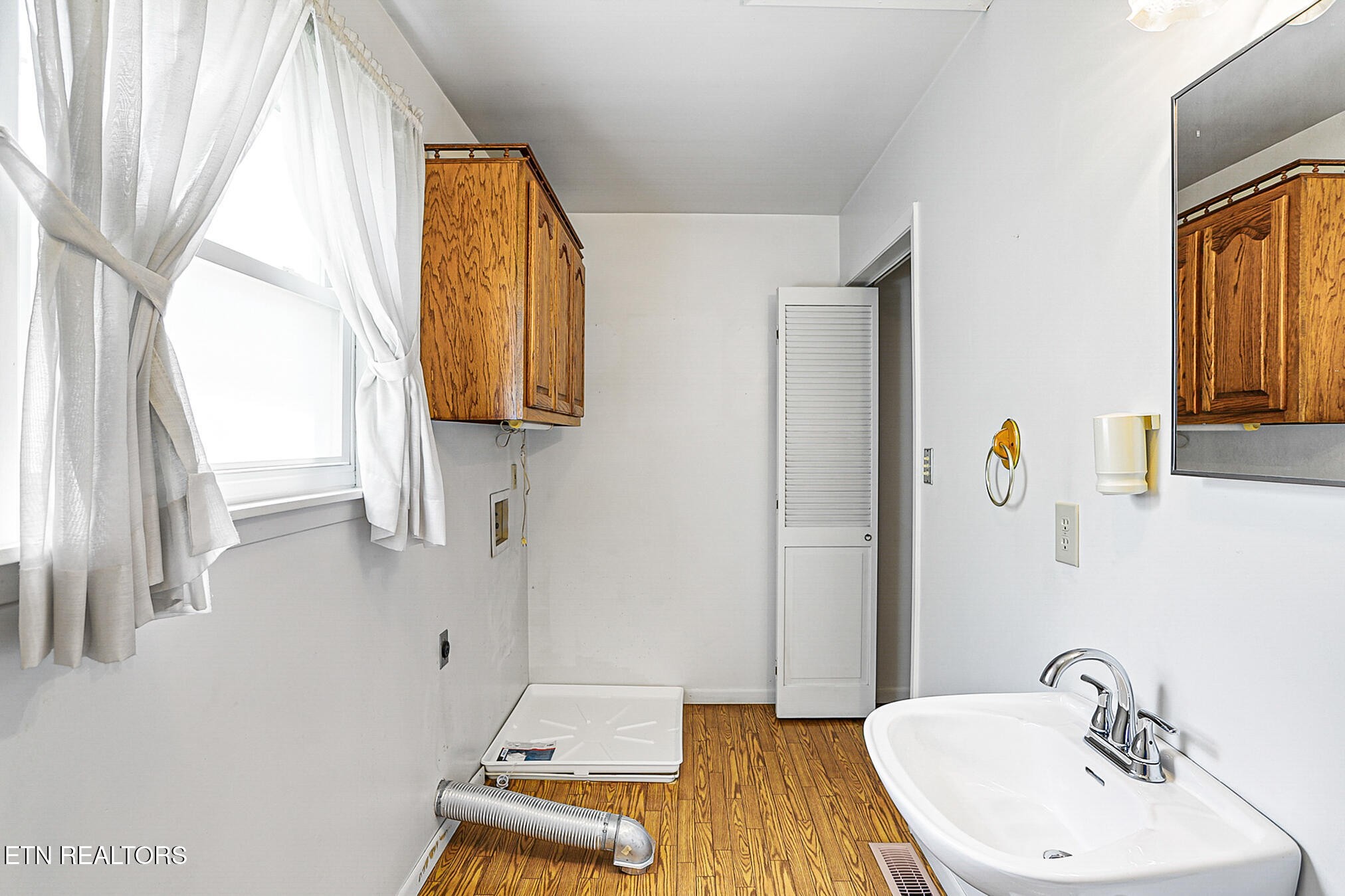 2015 Carolyn Drive Jefferson City, TN 37760 - Photo 12 of 44 a bathroom with a sink and a mirror