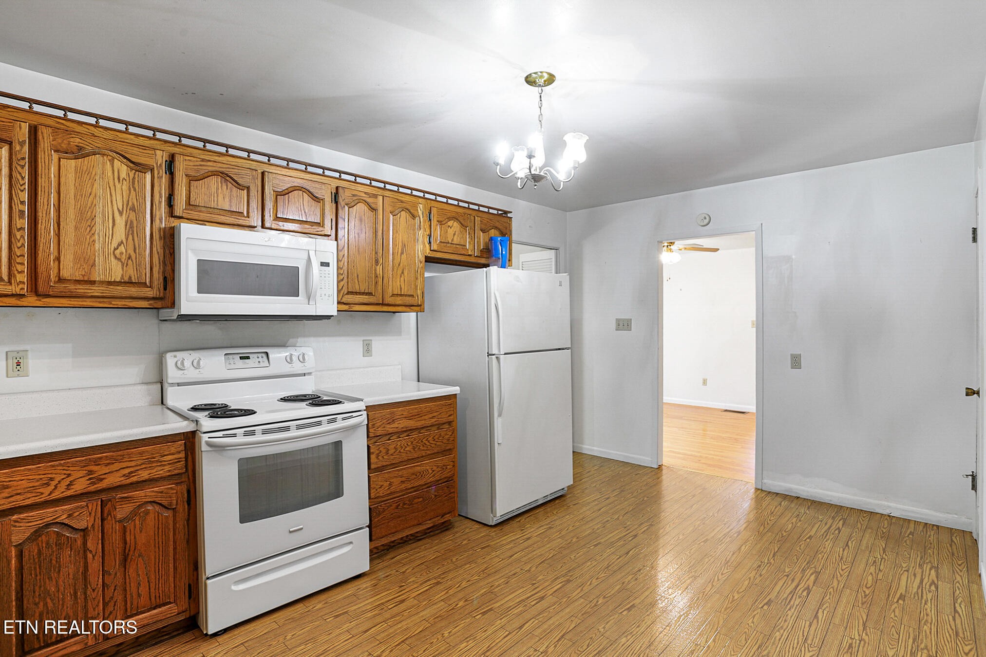 2015 Carolyn Drive Jefferson City, TN 37760 - Photo 15 of 44 a kitchen with stainless steel appliances a stove a refrigerator and a microwave