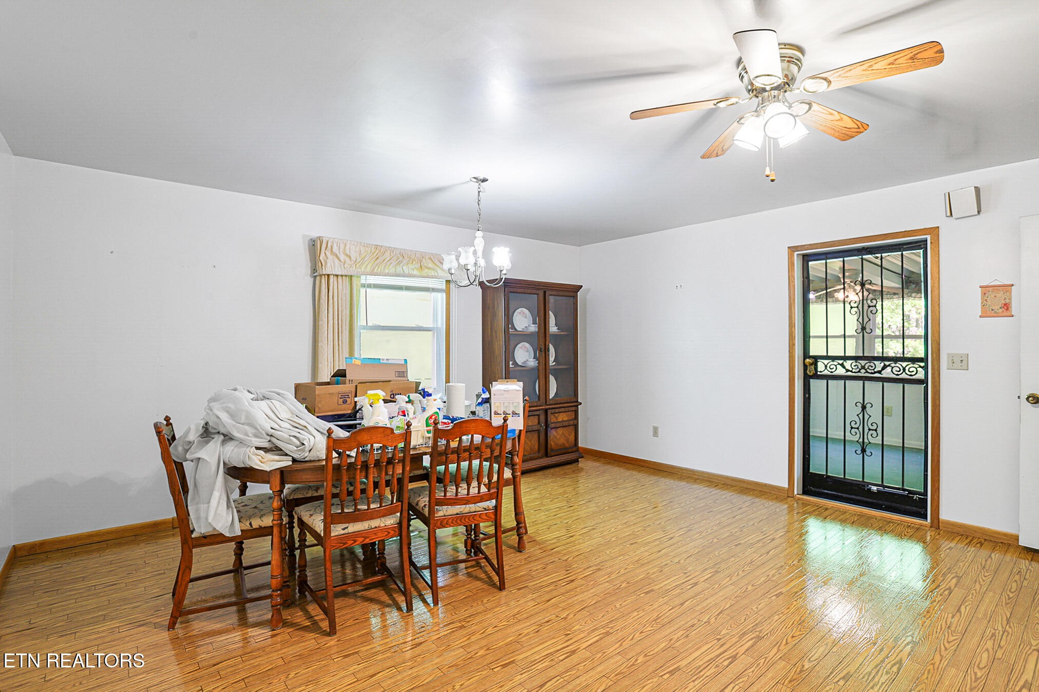 2015 Carolyn Drive Jefferson City, TN 37760 - Photo 18 of 44 a view of a dining room with furniture window and wooden floor