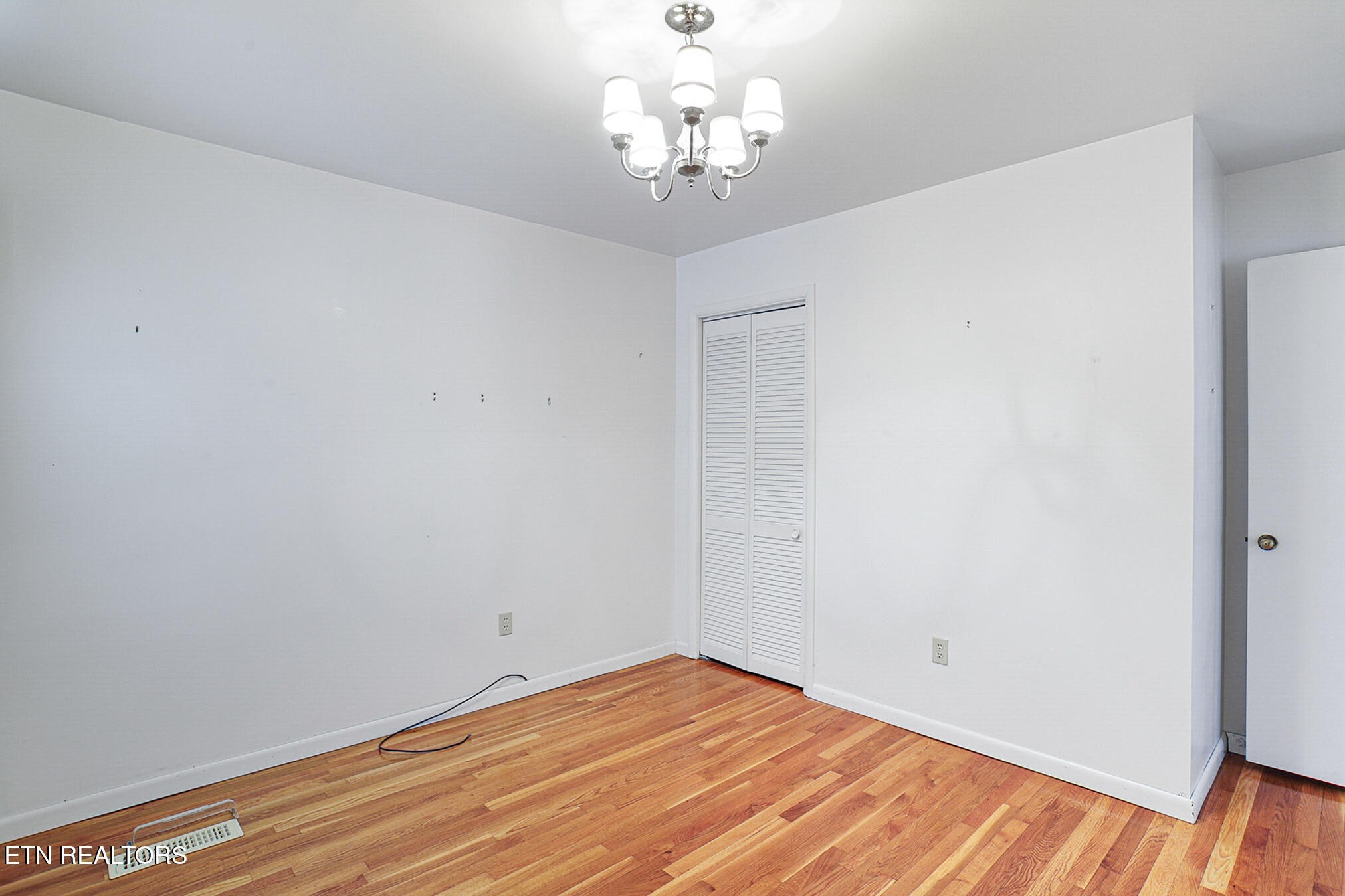 2015 Carolyn Drive Jefferson City, TN 37760 - Photo 23 of 44 a view of a chandelier fan and hardwood floor
