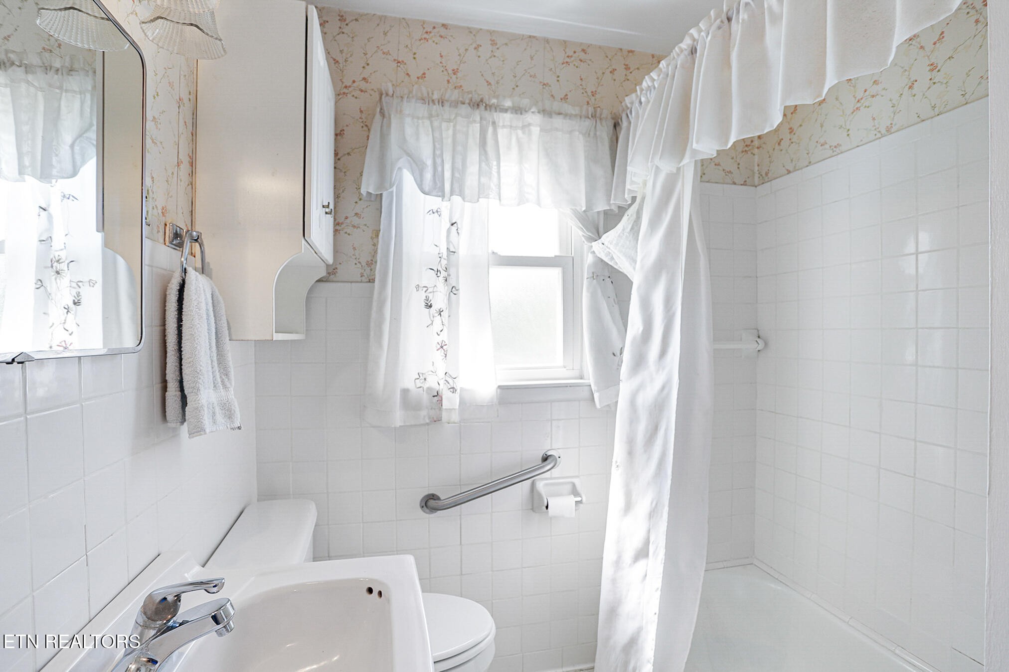 2015 Carolyn Drive Jefferson City, TN 37760 - Photo 26 of 44 a bathroom with a sink a toilet and shower