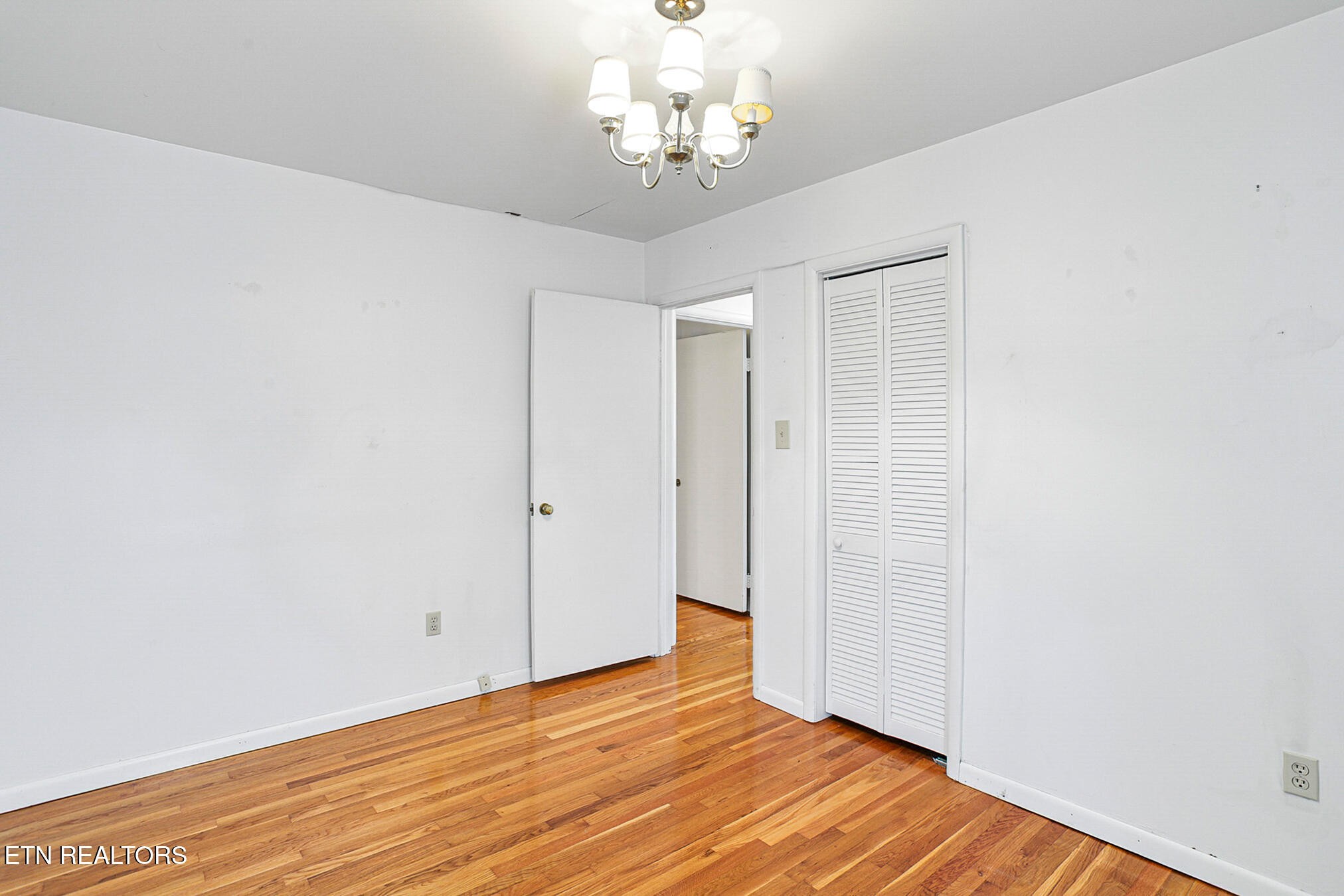 2015 Carolyn Drive Jefferson City, TN 37760 - Photo 28 of 44 a view of an empty room with wooden floor