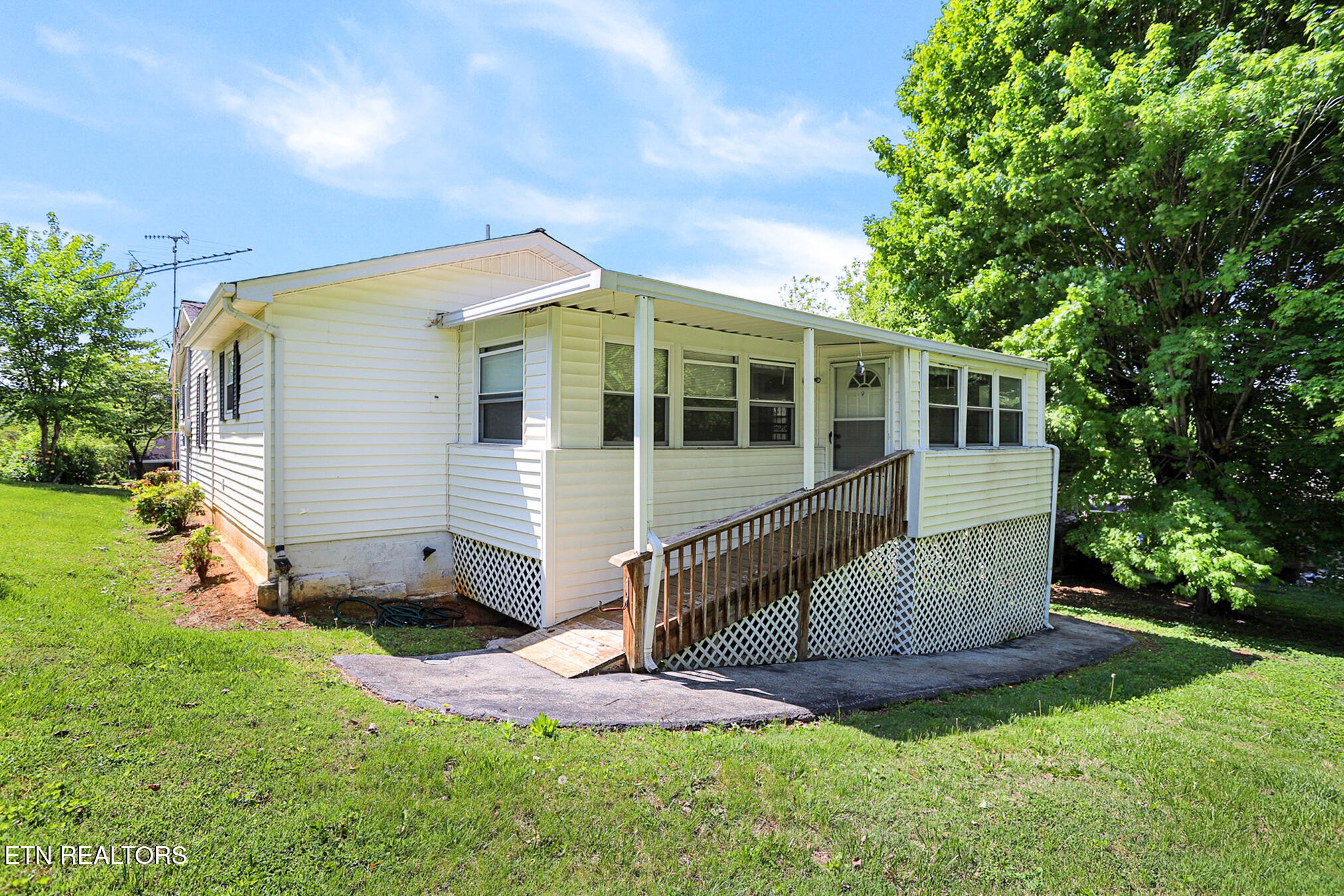2015 Carolyn Drive Jefferson City, TN 37760 - Photo 42 of 44 a view of a house with a yard and sitting area