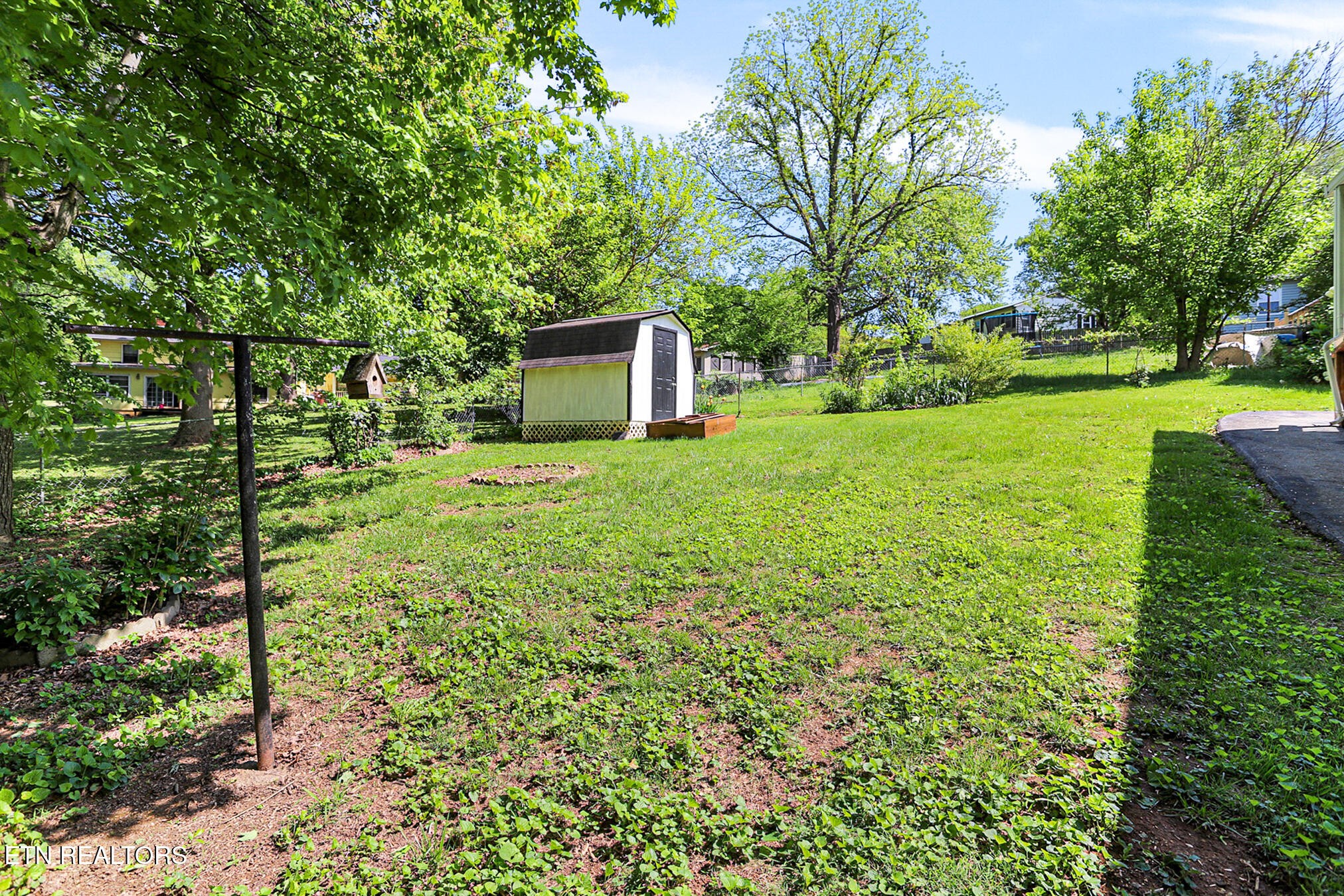 2015 Carolyn Drive Jefferson City, TN 37760 - Photo 44 of 44 a view of a backyard with large trees