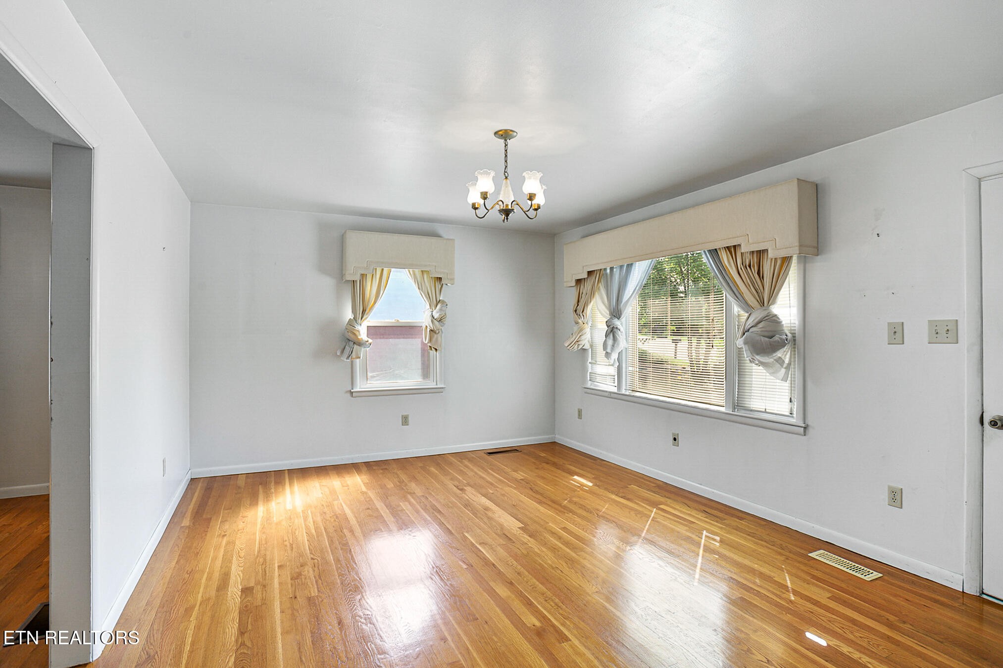 2015 Carolyn Drive Jefferson City, TN 37760 - Photo 5 of 44 wooden floor in an empty room with a window