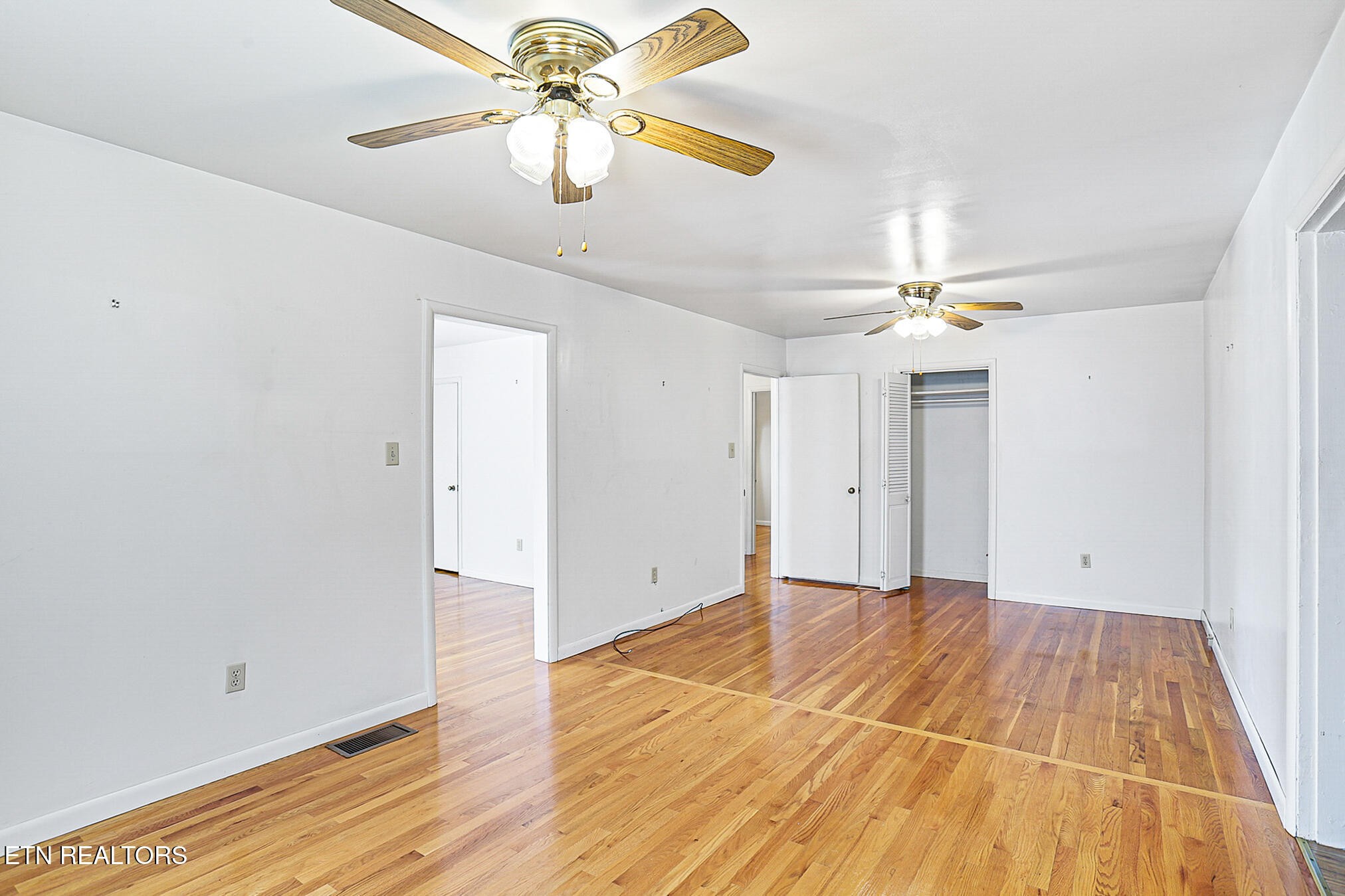 2015 Carolyn Drive Jefferson City, TN 37760 - Photo 9 of 44 a view of an empty room with wooden floor