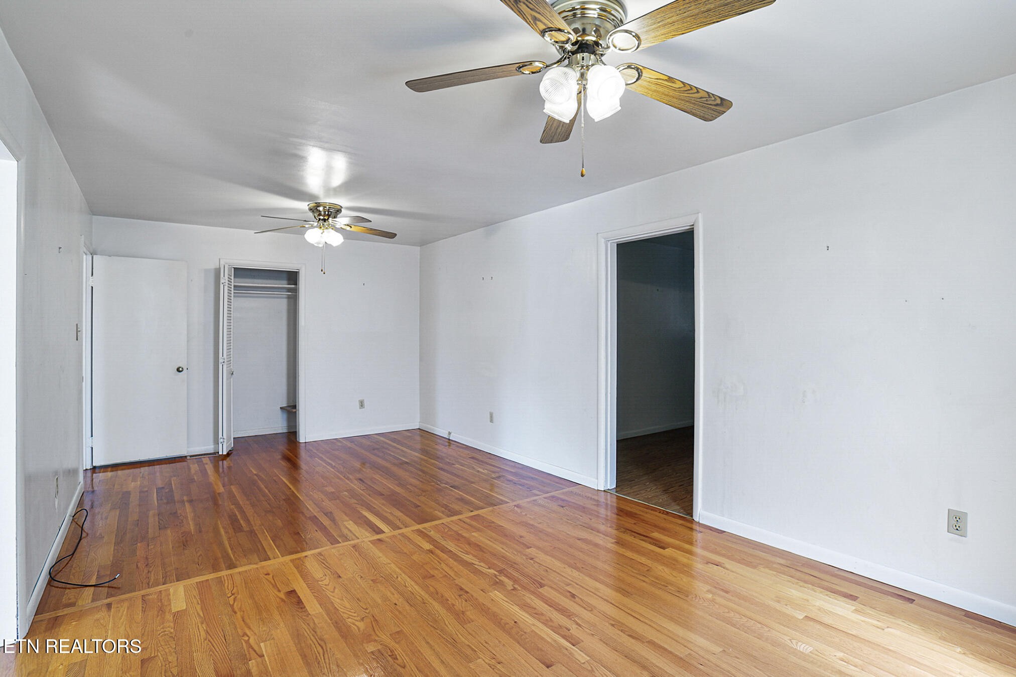 2015 Carolyn Drive Jefferson City, TN 37760 - Photo 10 of 44 a view of an empty room with a chandelier fan