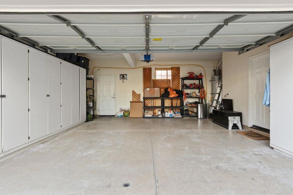 7039 Whitewater Street Carlsbad, CA 92011 - Photo 32 of 65 a view of a room with wooden furniture