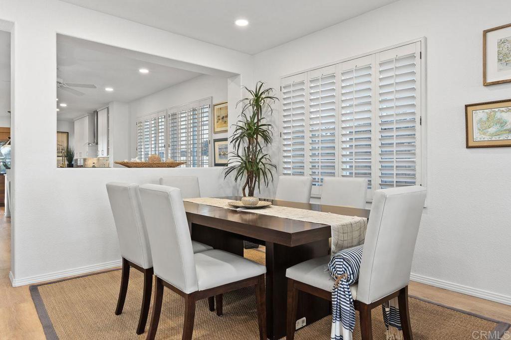 7039 Whitewater Street Carlsbad, CA 92011 - Photo 4 of 65 a dining room with furniture and window