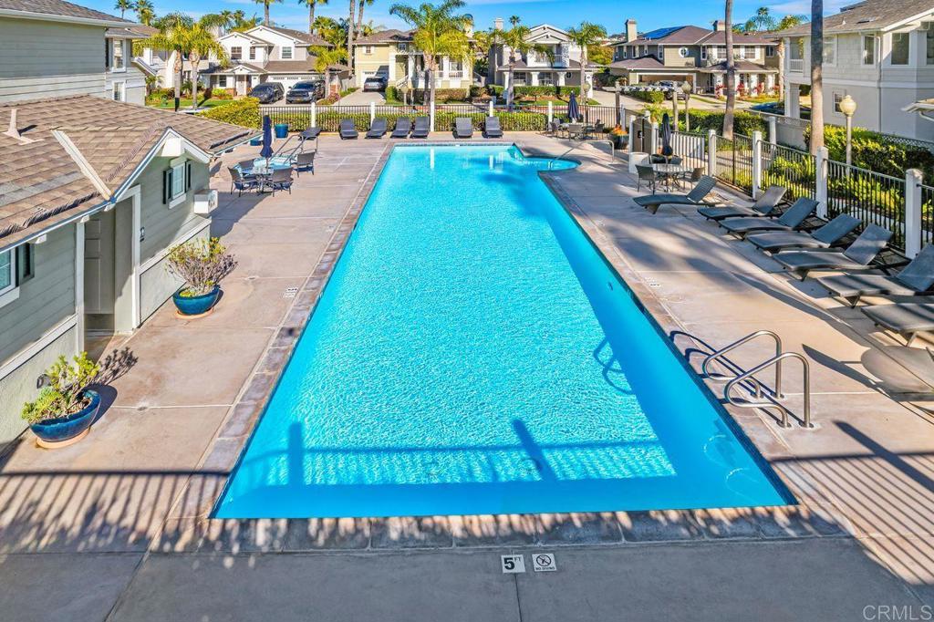 7039 Whitewater Street Carlsbad, CA 92011 - Photo 49 of 65 a view of swimming pool from a balcony