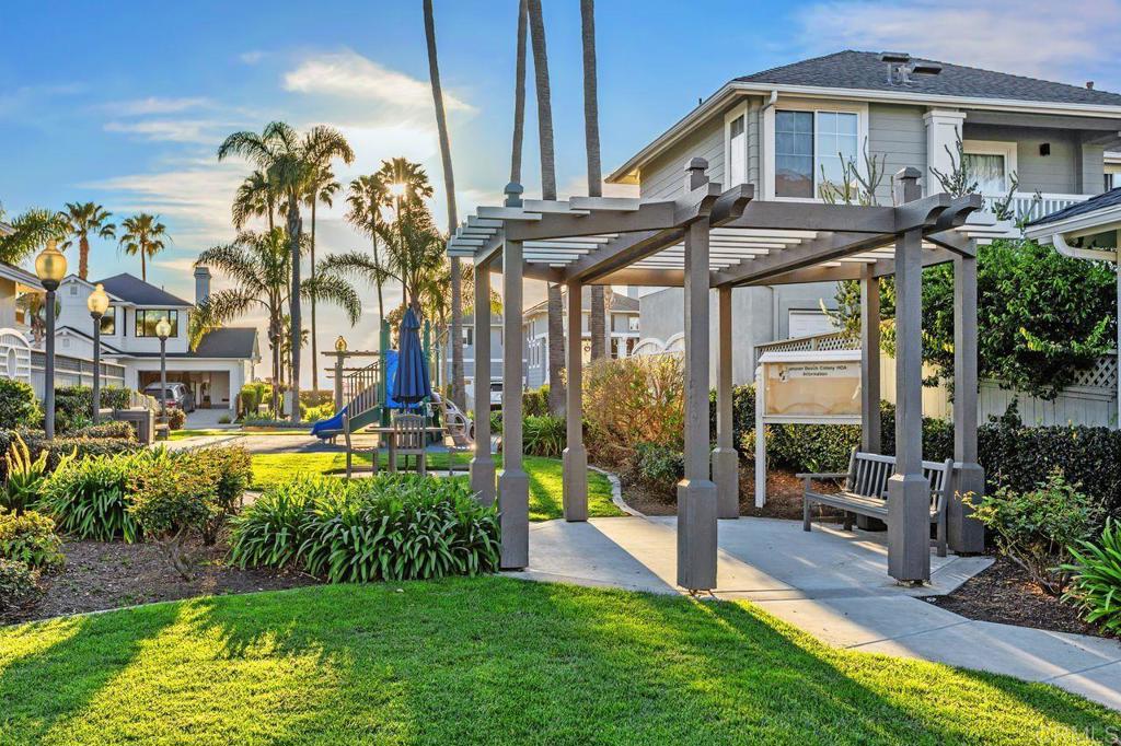 7039 Whitewater Street Carlsbad, CA 92011 - Photo 51 of 65 a view of a house with a yard
