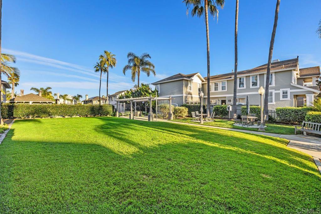 7039 Whitewater Street Carlsbad, CA 92011 - Photo 52 of 65 a view of a house with a big yard