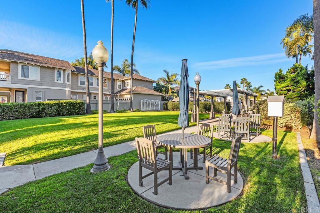 7039 Whitewater Street Carlsbad, CA 92011 - Photo 53 of 65 a view of a swimming pool with a patio