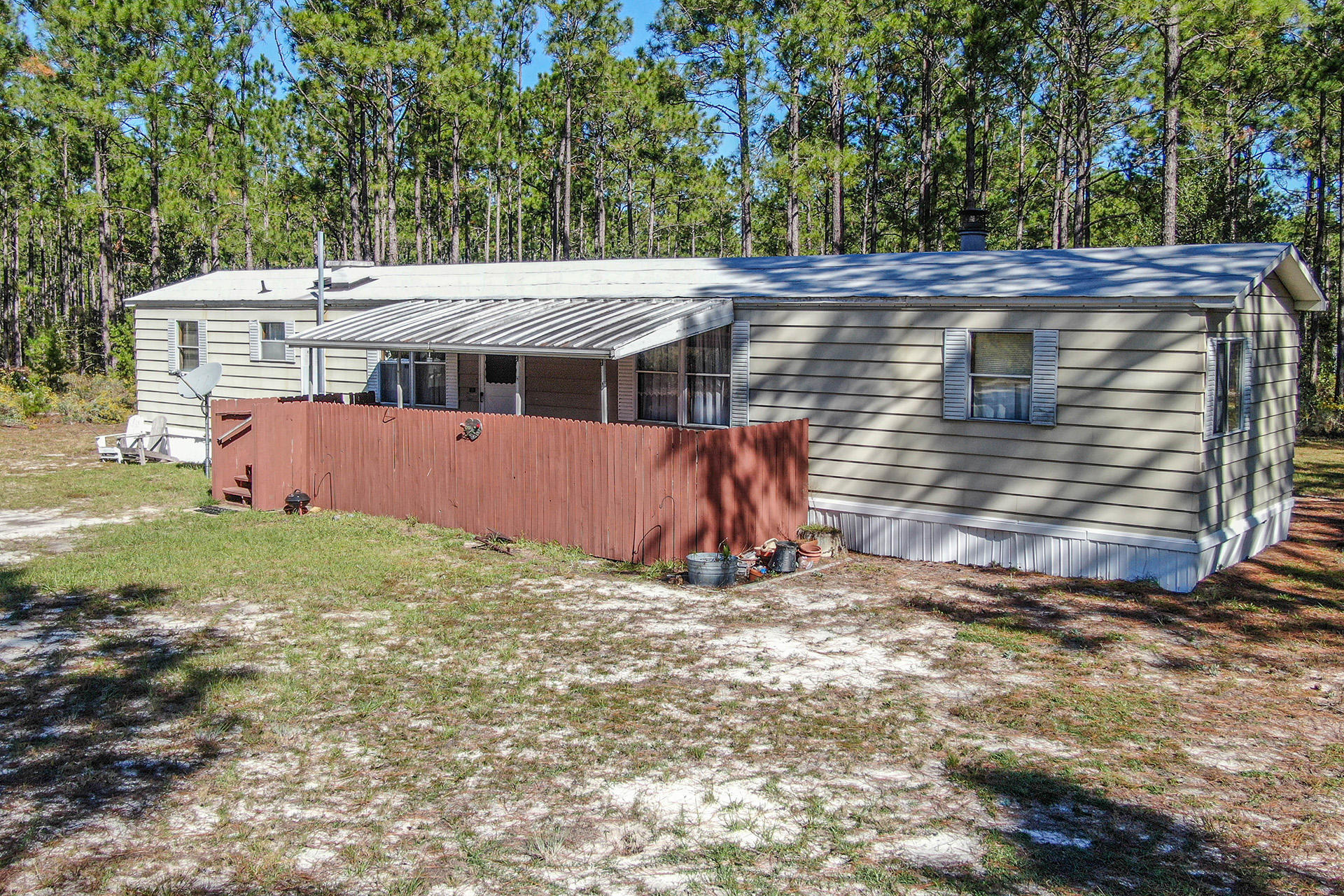 887 Don Graff Road Freeport, FL 32439 - Photo 5 of 17 a view of a barn house