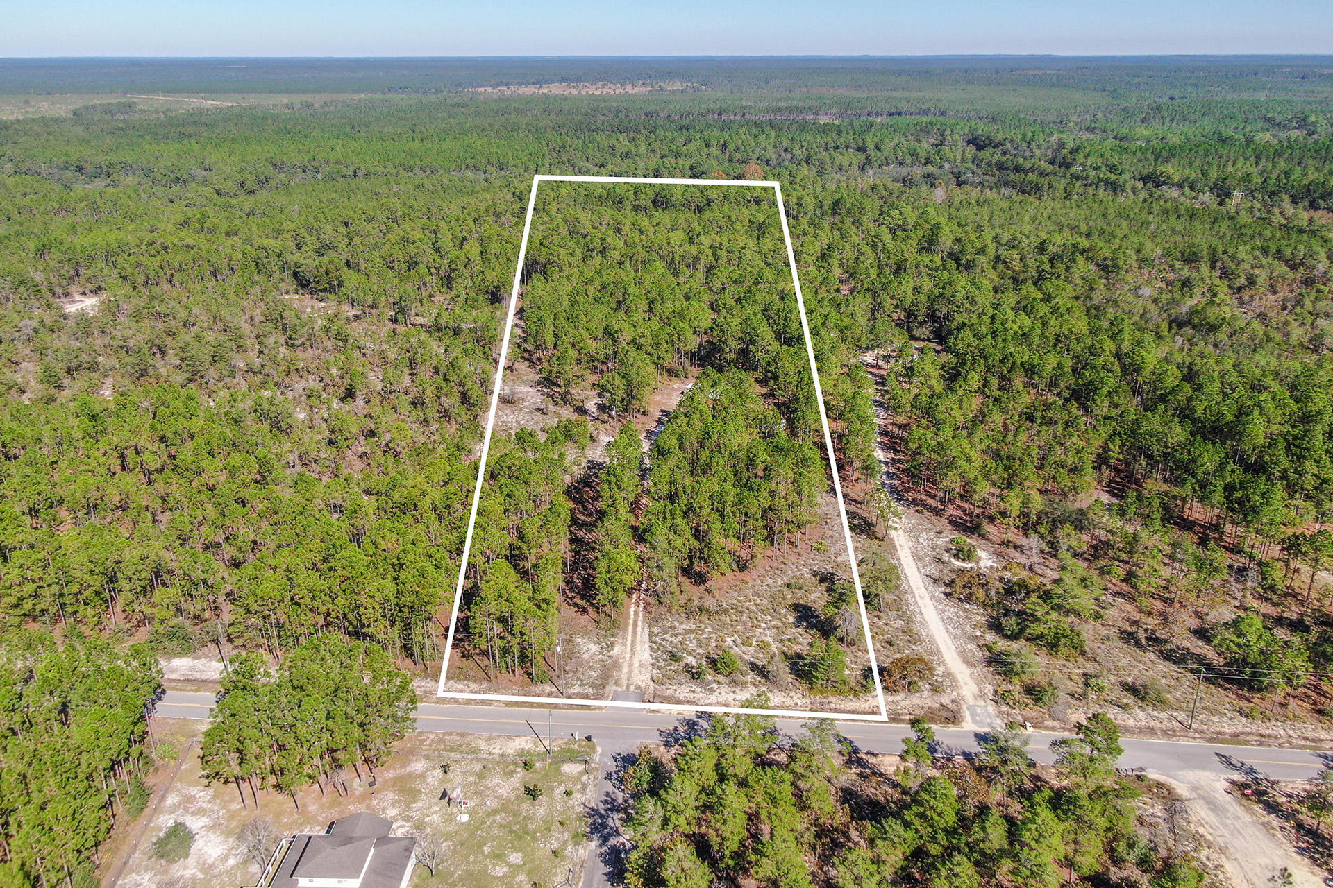 887 Don Graff Road Freeport, FL 32439 - Photo 8 of 17 a view of a yard with an outdoor space