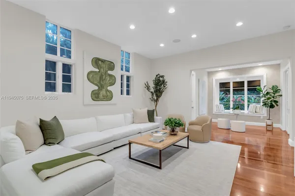 a living room with furniture and window
