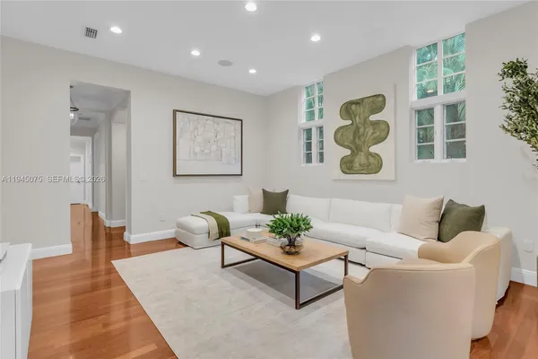 a living room with furniture and window