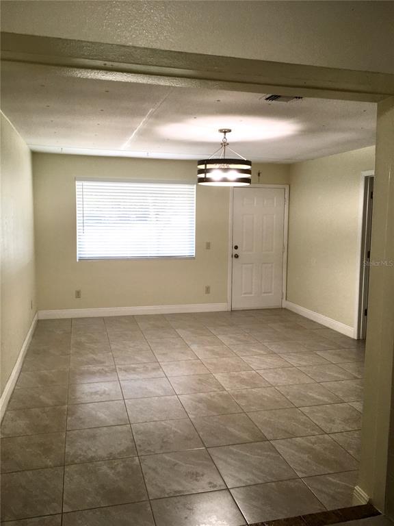 539 Libby Road Babson Park, FL 33827 - Photo 21 of 89 a view of a room with an empty space and a window