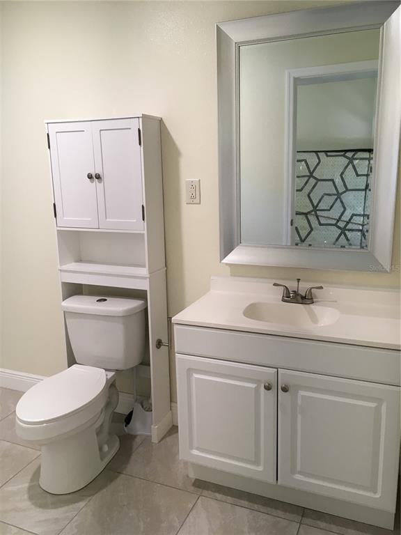 539 Libby Road Babson Park, FL 33827 - Photo 26 of 89 a bathroom with a sink a toilet and mirror