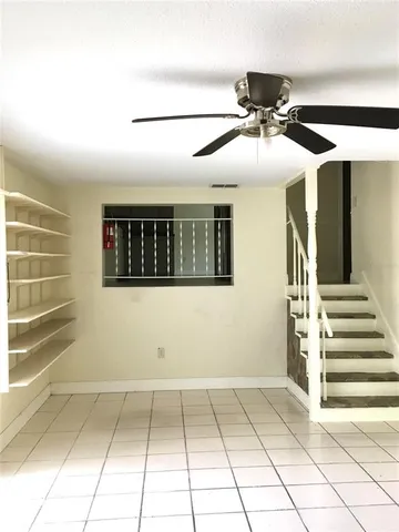 a view of storage and utility room with washer and dryer