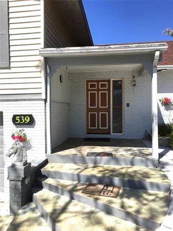 a view of a backyard with a garden