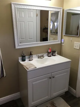 a view of a swimming pool with a patio