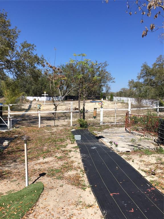 539 Libby Road Babson Park, FL 33827 - Photo 63 of 89 a view of a backyard of the house