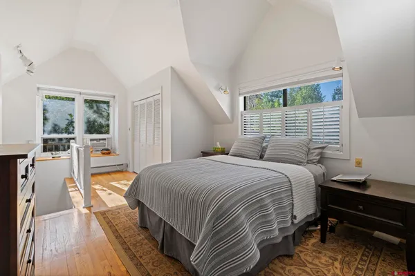 a room with furniture and a large window