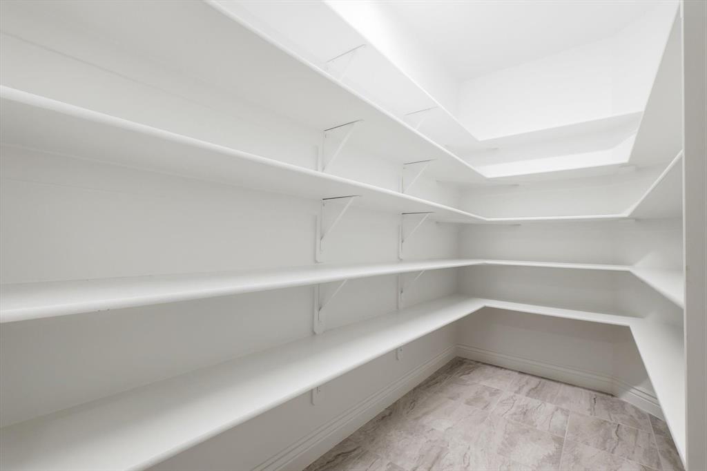 8813 Basanite Avenue Denton, TX 76207 - Photo 15 of 40 a view of an empty walk in closet