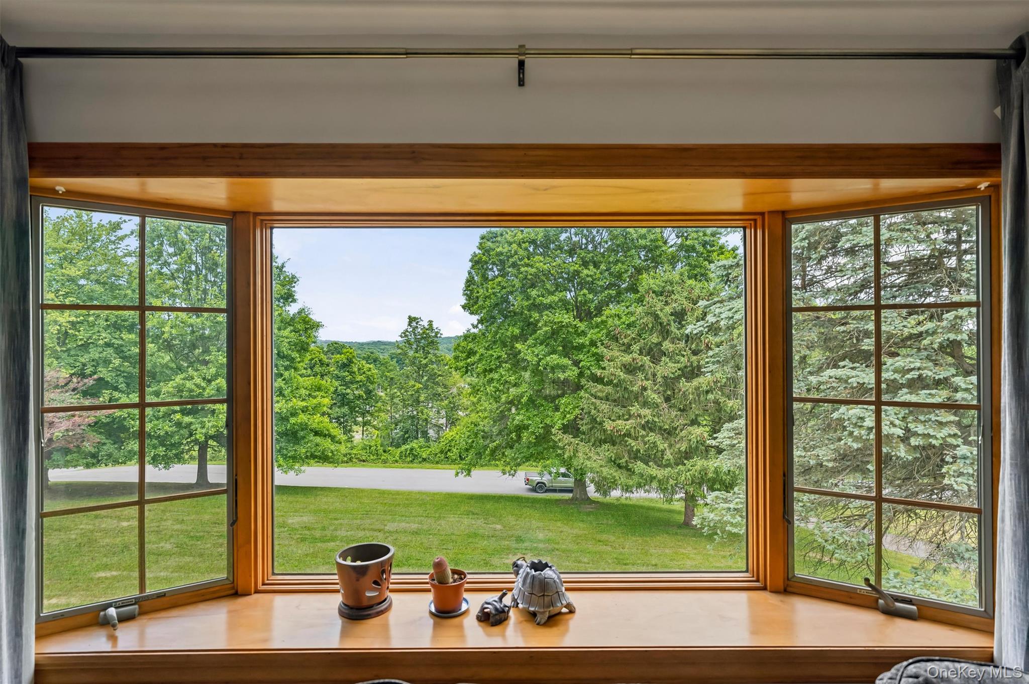 318 Beattie Road Washingtonville, NY 10992 - Photo 8 of 42 a room with a large window and lake view