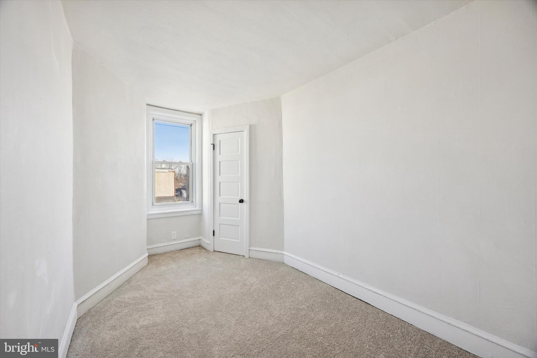 2537 South Millick Street Philadelphia, PA 19142 - Photo 11 of 15 a view of an empty room and closet area