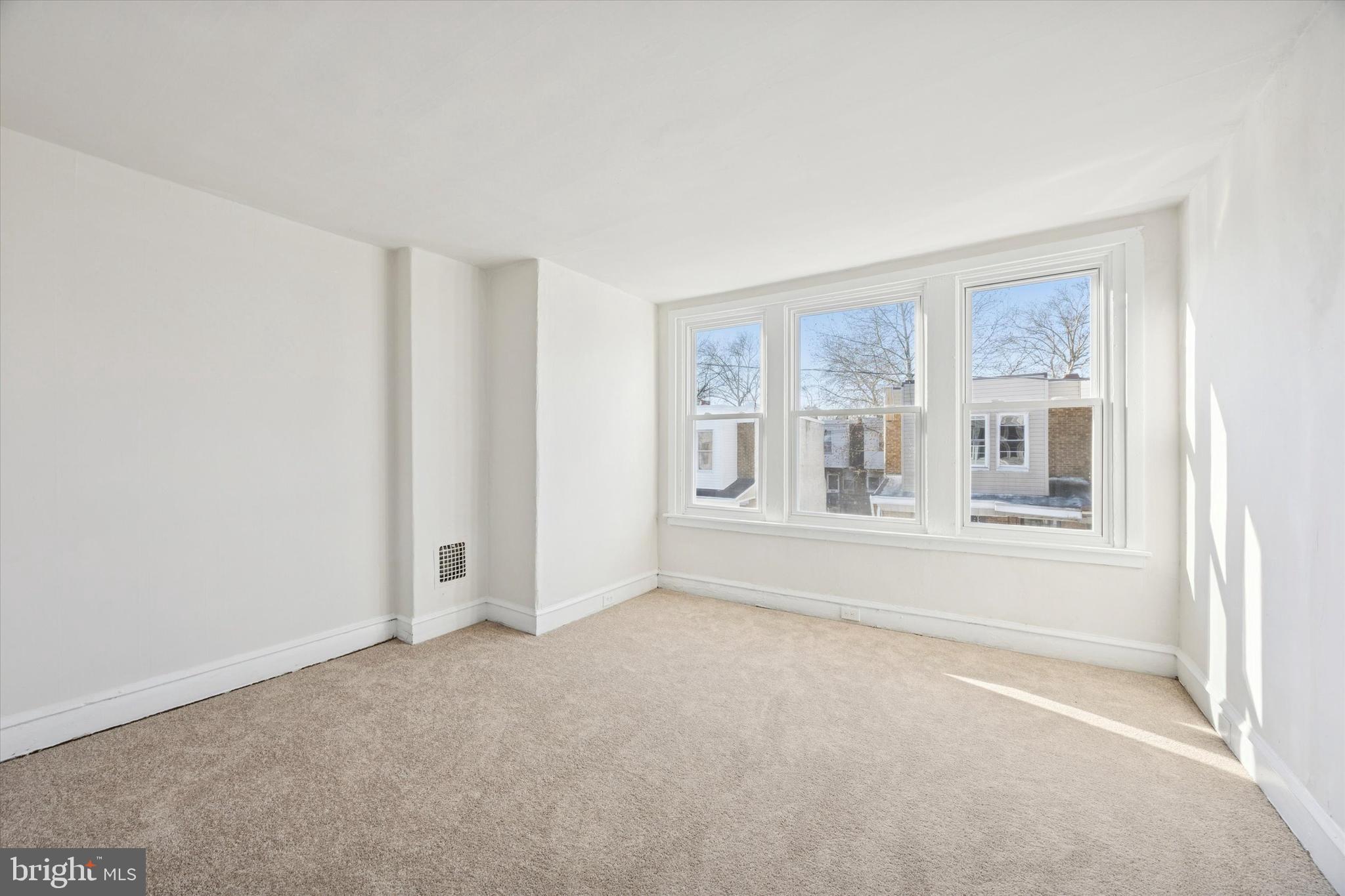 2537 South Millick Street Philadelphia, PA 19142 - Photo 13 of 15 a view of an empty room with a window