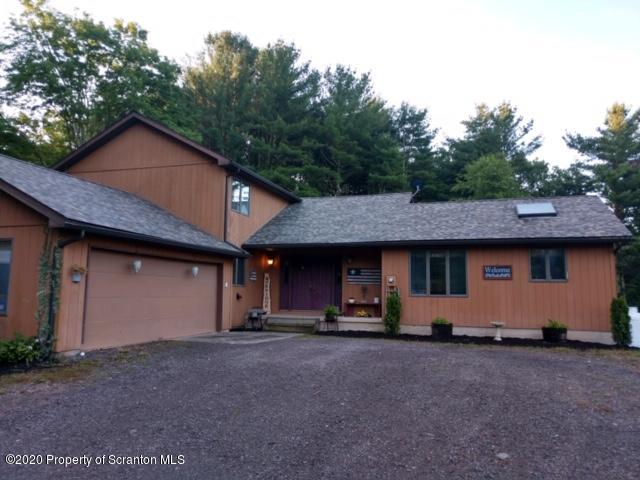 871 Swamp Road Hunlock Creek, PA 18621 - Photo 2 of 64 a house view with a outdoor space