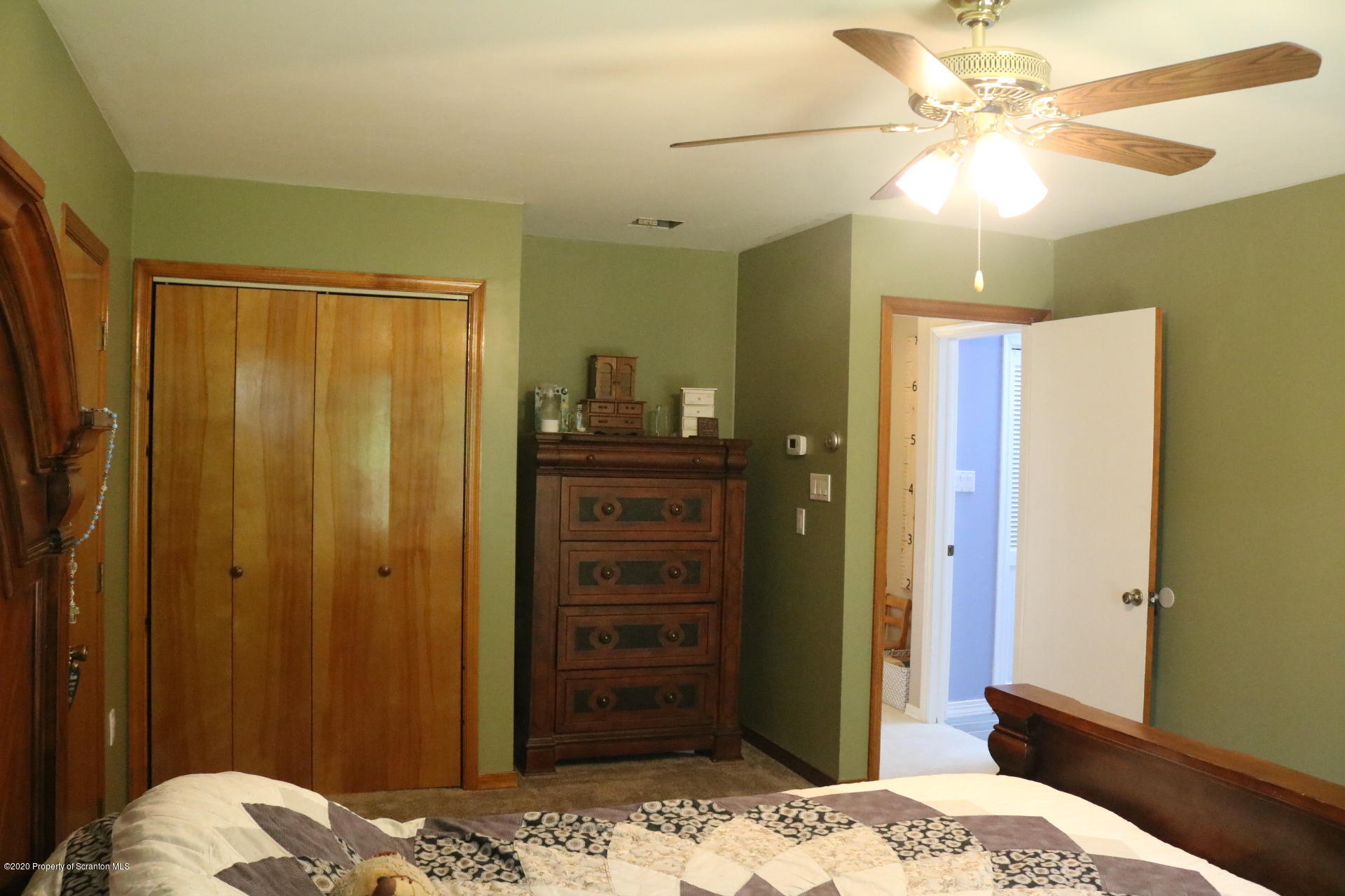 871 Swamp Road Hunlock Creek, PA 18621 - Photo 34 of 64 a bedroom with a bed and a dresser