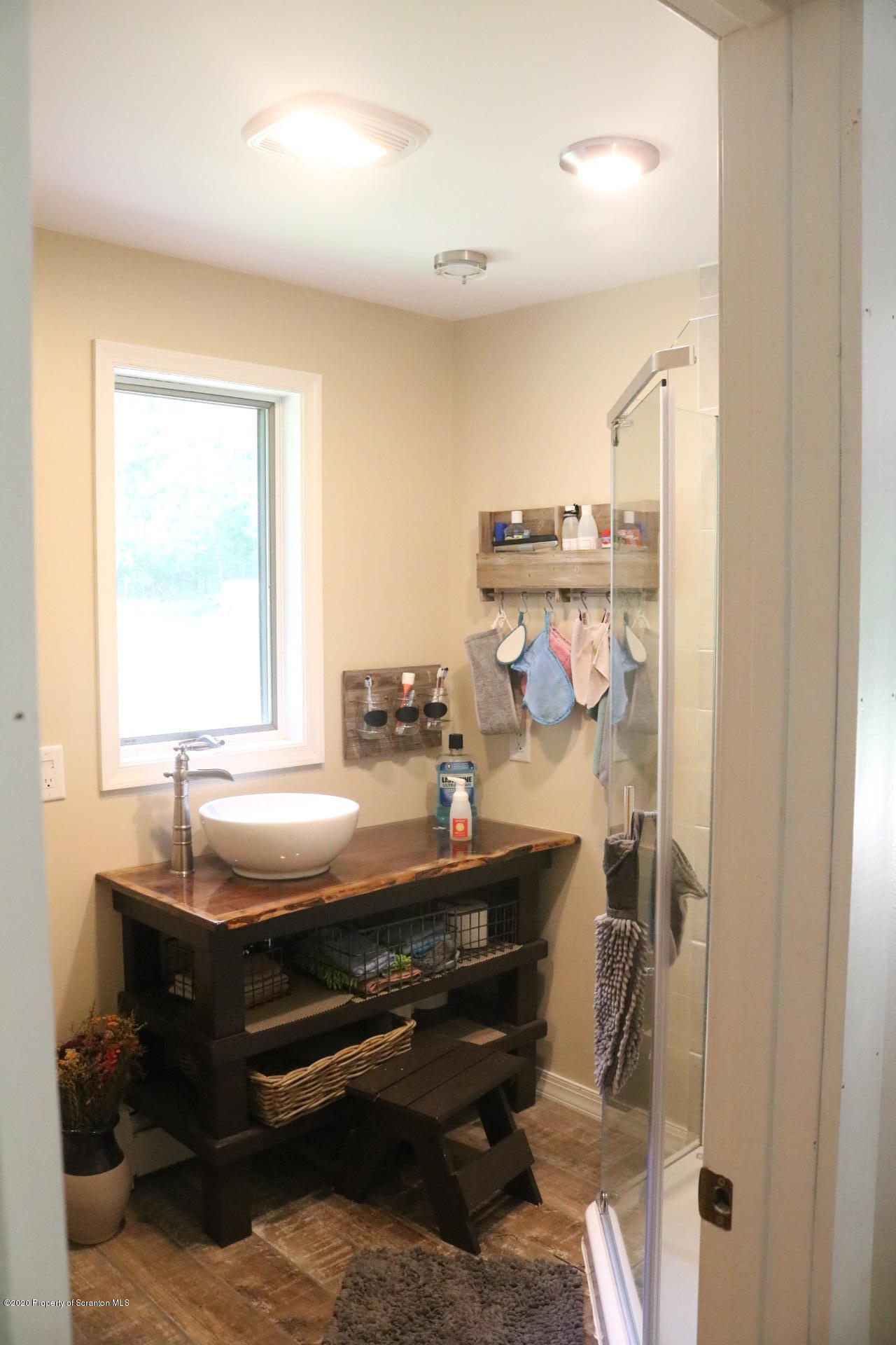 871 Swamp Road Hunlock Creek, PA 18621 - Photo 44 of 64 a room with a bed and a window