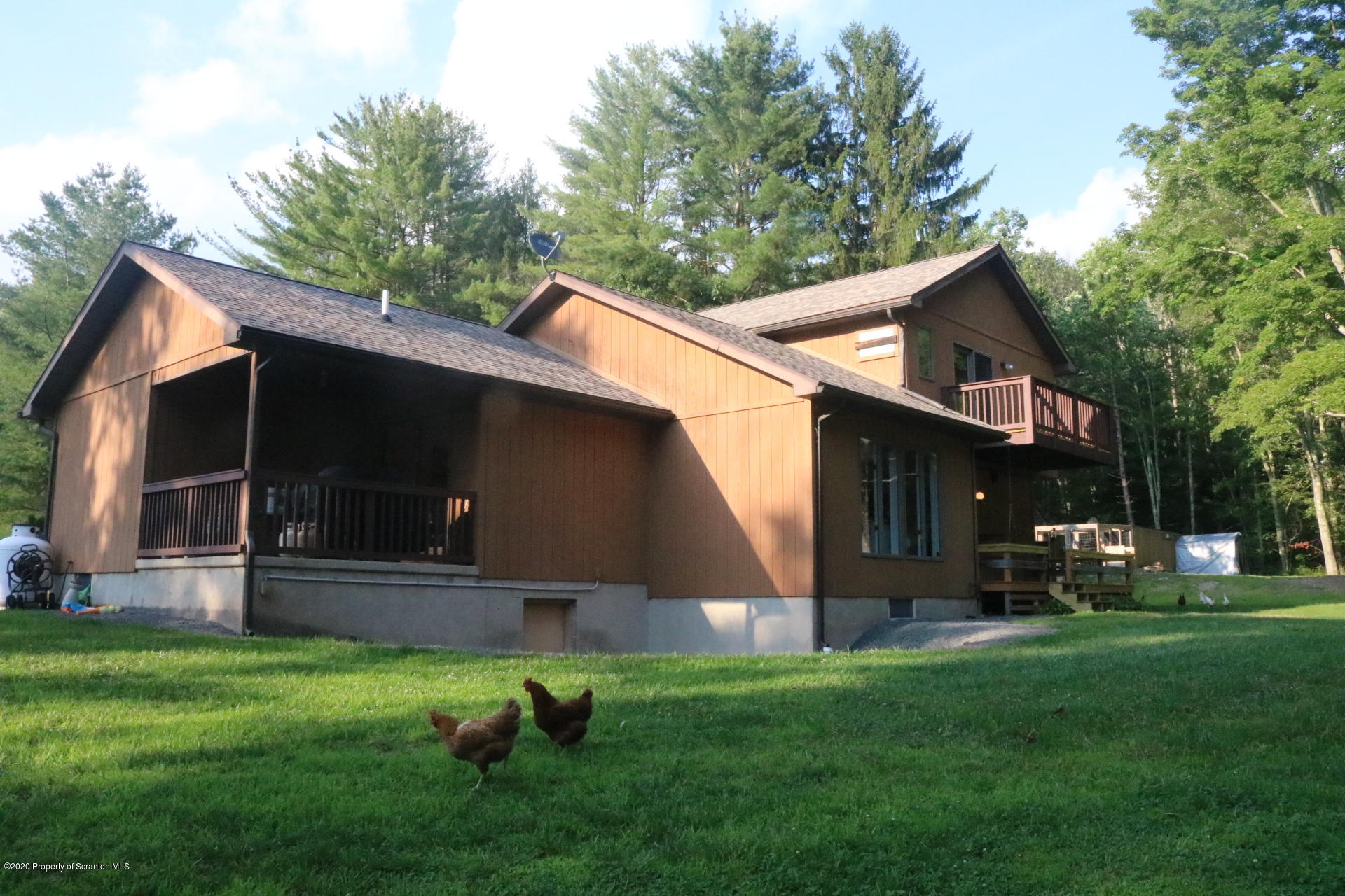 871 Swamp Road Hunlock Creek, PA 18621 - Photo 6 of 64 a front view of house with yard