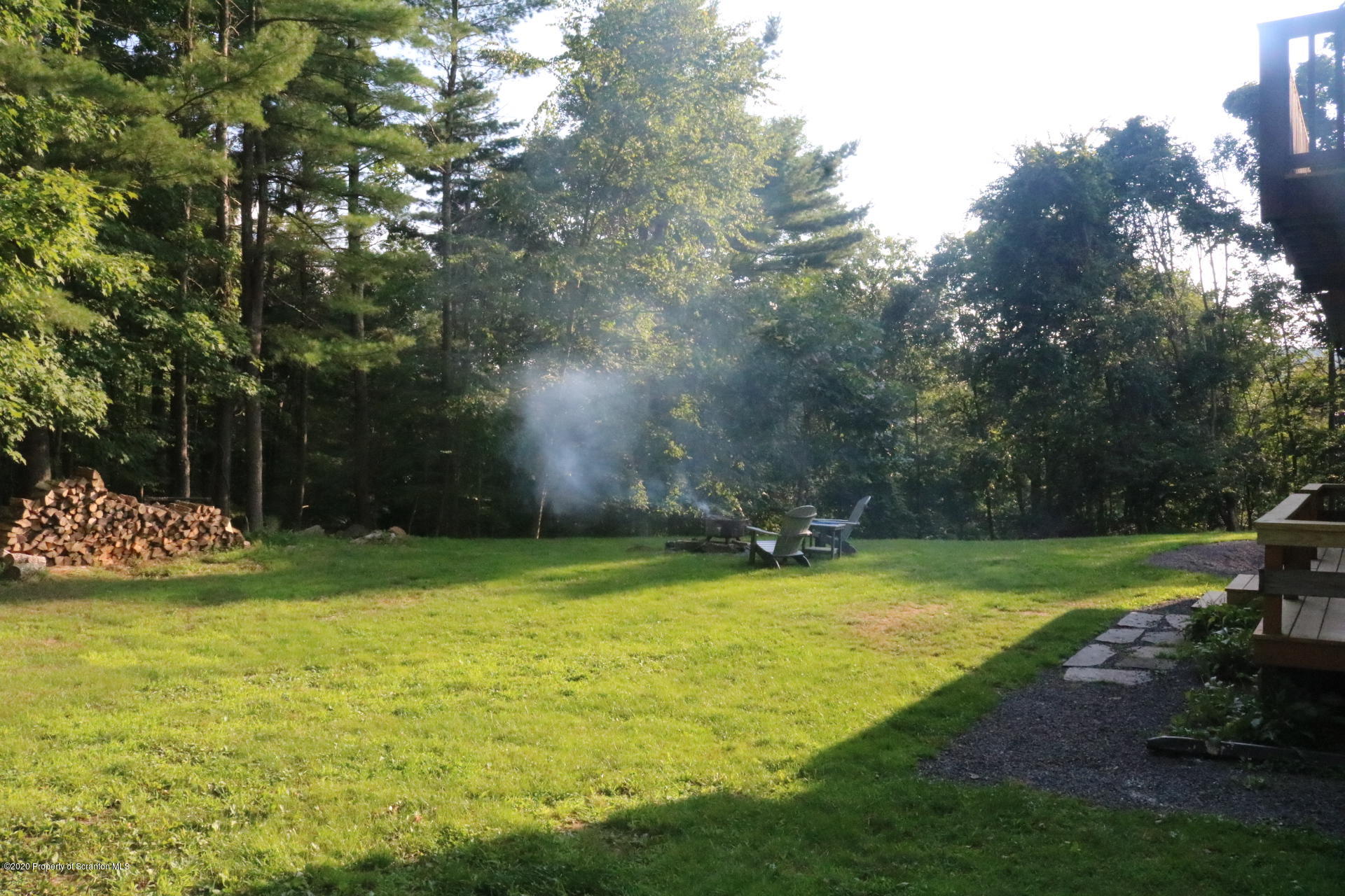 871 Swamp Road Hunlock Creek, PA 18621 - Photo 62 of 64 a view of a swimming pool with lawn chairs and a big yard