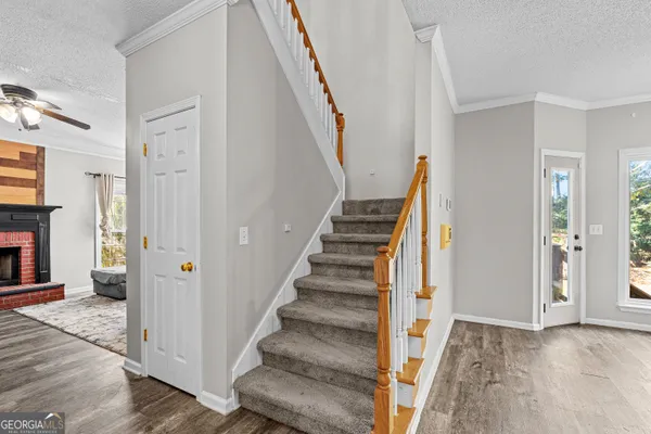 a view of an entryway with staircase