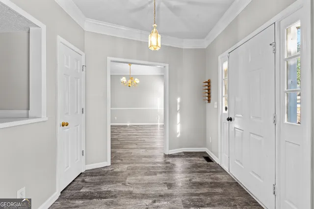 a view of balcony with wooden floor and fence