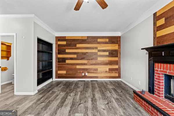 a room with a bed and a walk in closet