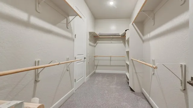 a view of entryway with stairs and wooden floor