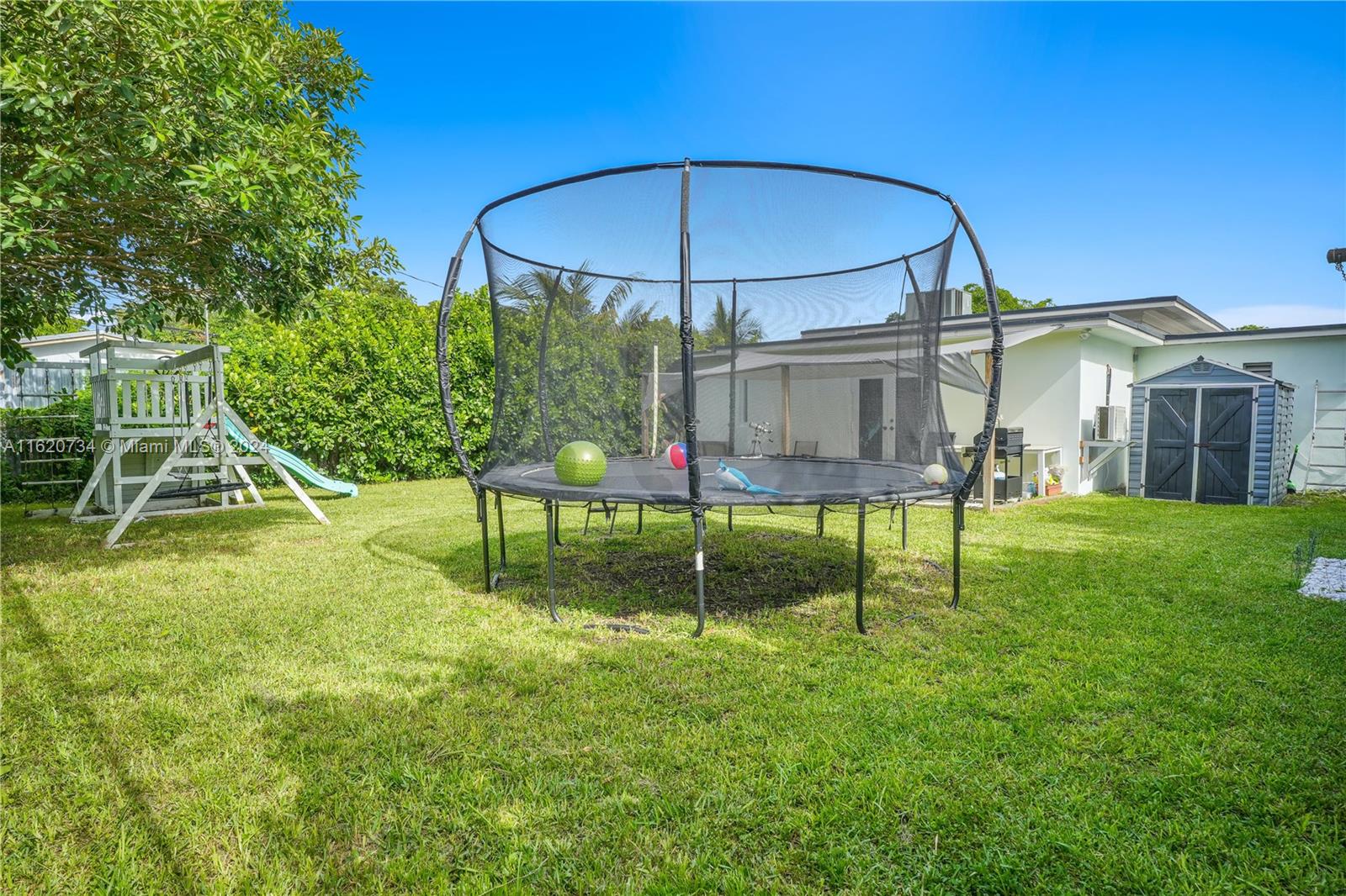 6411 Southwest 41st Street Miami, FL 33155 - Photo 15 of 17 a garden view with a seating space