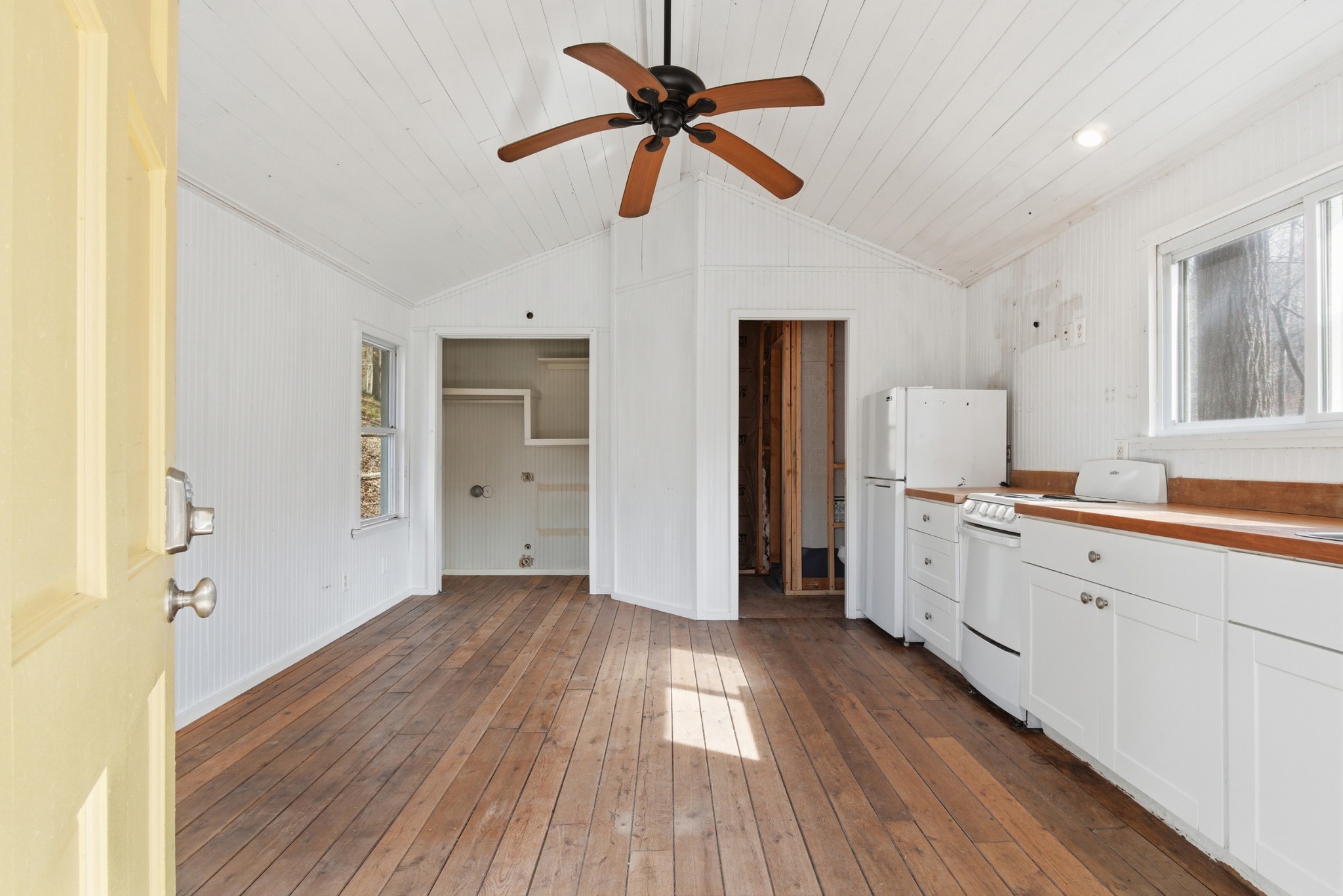 3972 Skelley Road Santa Fe, TN 38482 - Photo 20 of 47 a large kitchen with a wooden floor and stainless steel appliances