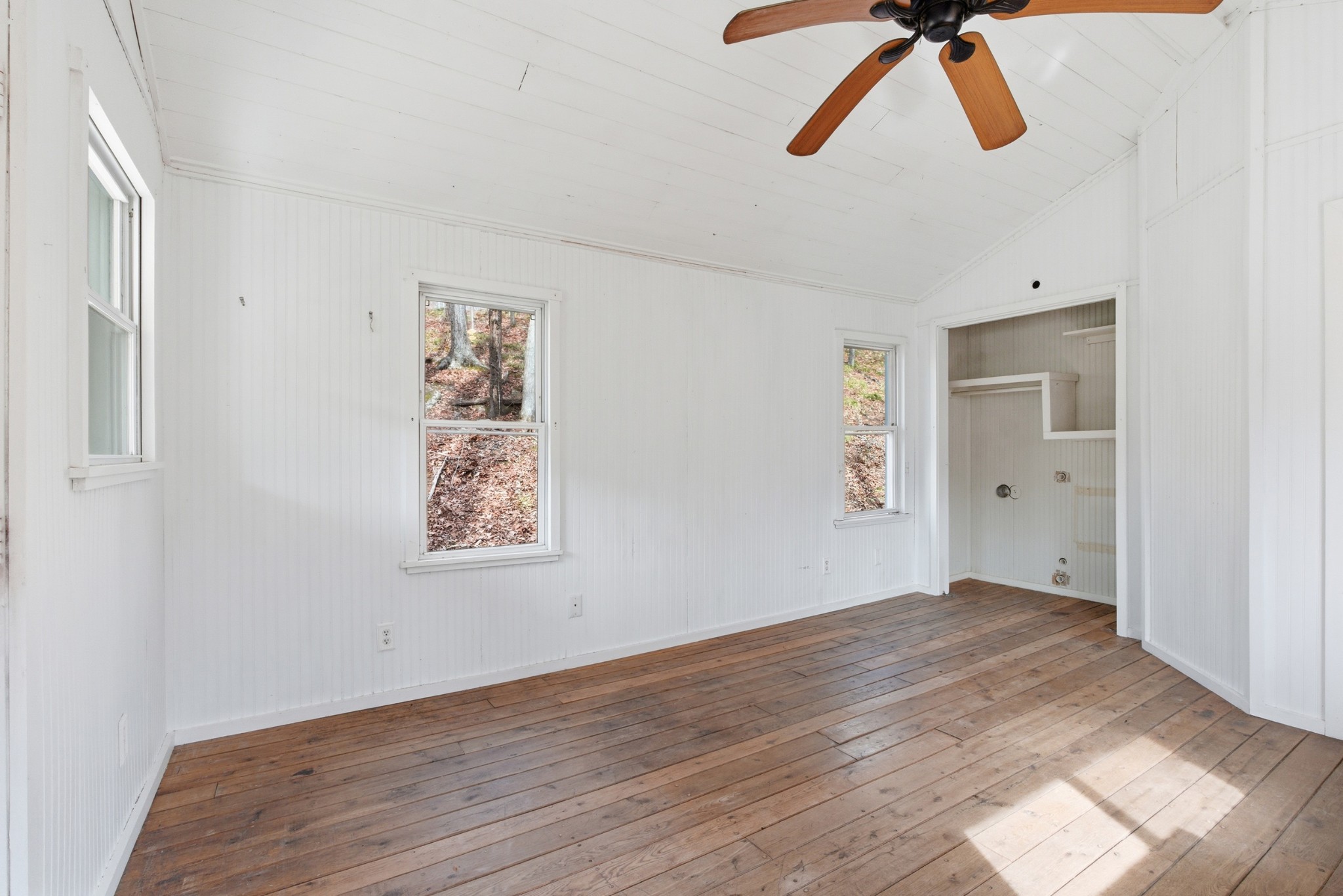 3972 Skelley Road Santa Fe, TN 38482 - Photo 27 of 47 a view of an empty room with window and wooden floor